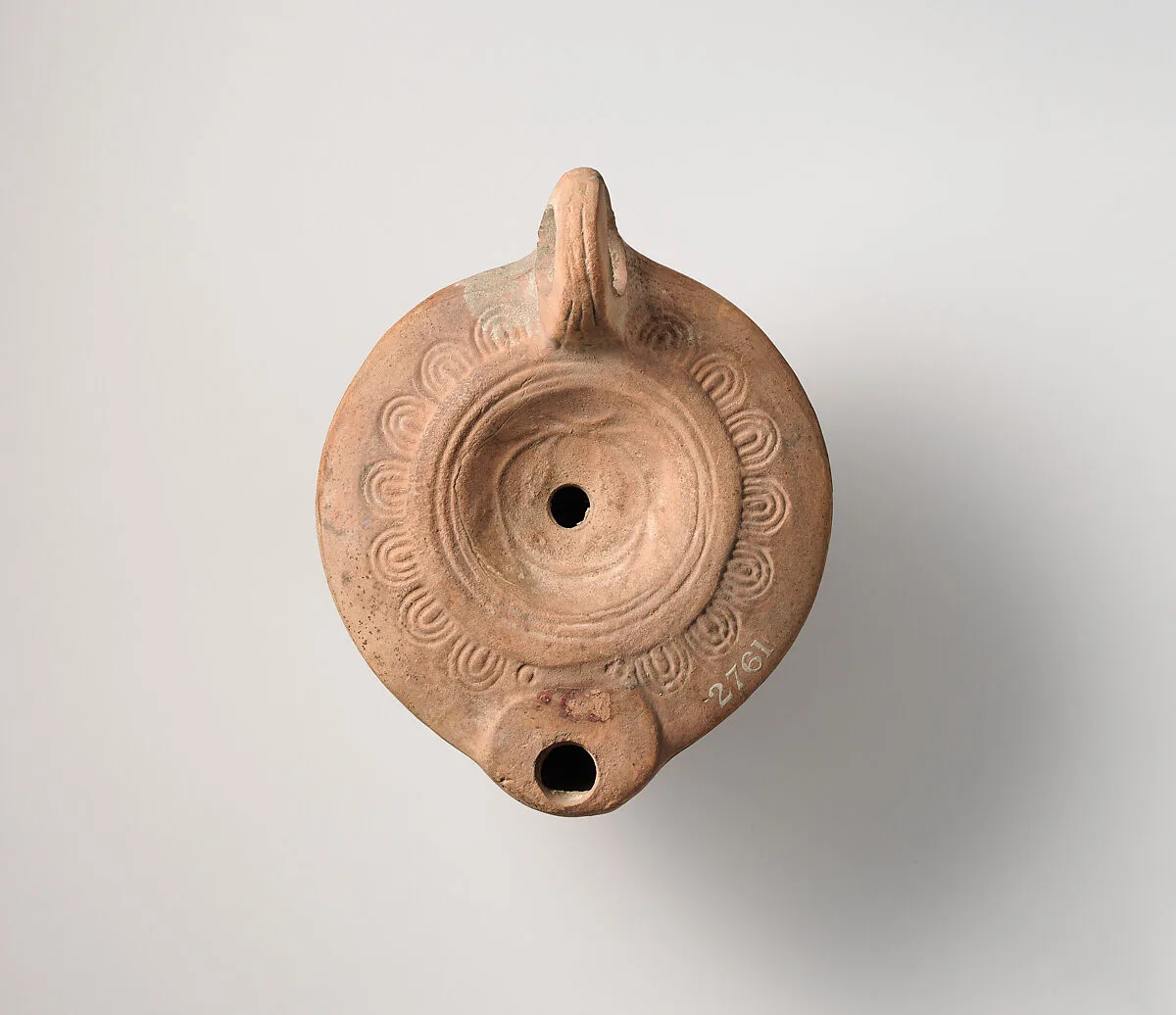 Terracotta oil lamp — Unknown