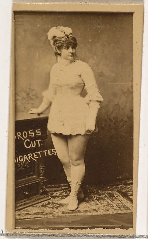 Standing actress resting hand on table, from the Actors and Actresses series (N145-1) issued by Duke Sons & Co. to promote Cross Cut Cigarettes — W. Duke, Sons & Co.