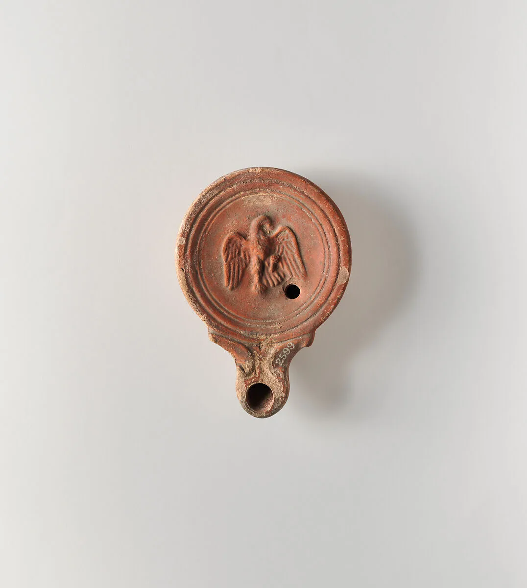Terracotta oil lamp — Unknown