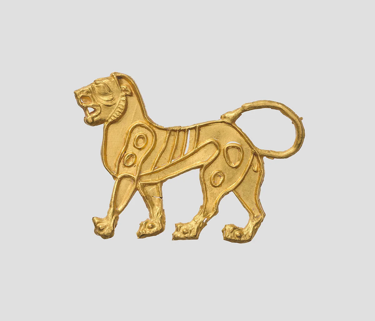 Applique in the shape of a lion — Unknown