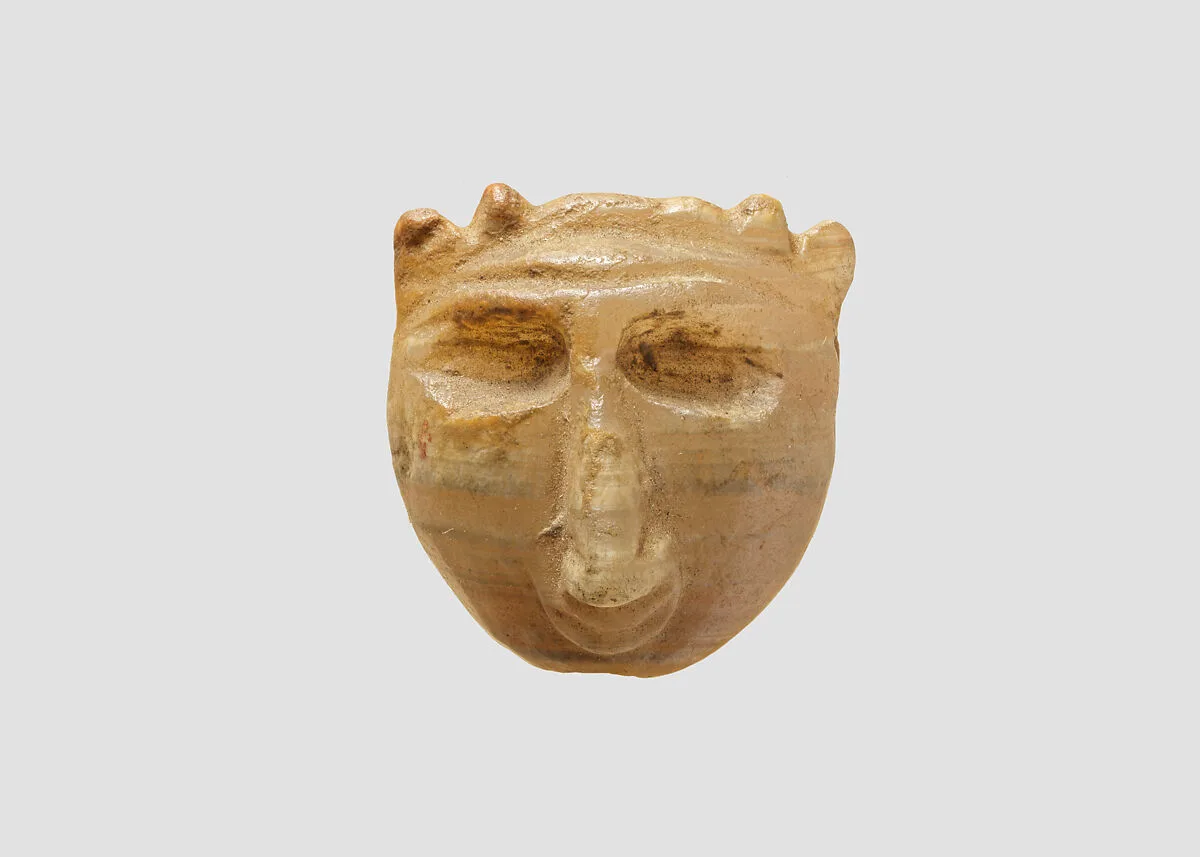 Demon-headed amulet — Unknown
