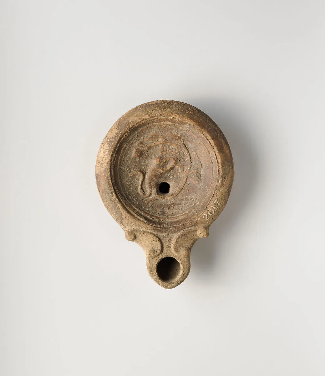 Terracotta oil lamp — Unknown