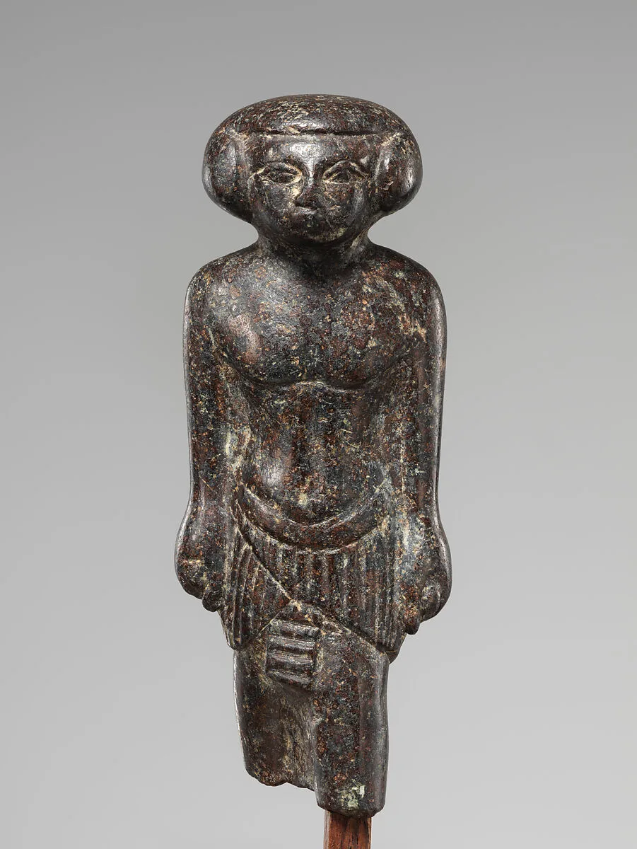 Figure of a Striding Man — Unknown