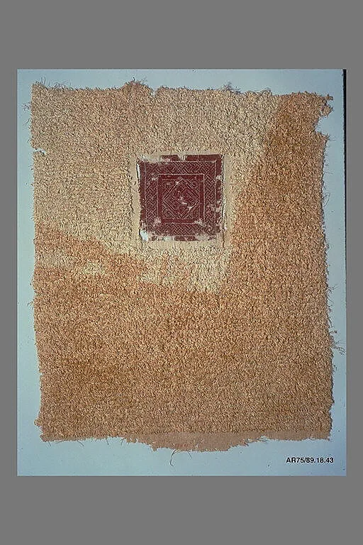 Fragment of a Cover or Blanket with Interlace Square — Unknown