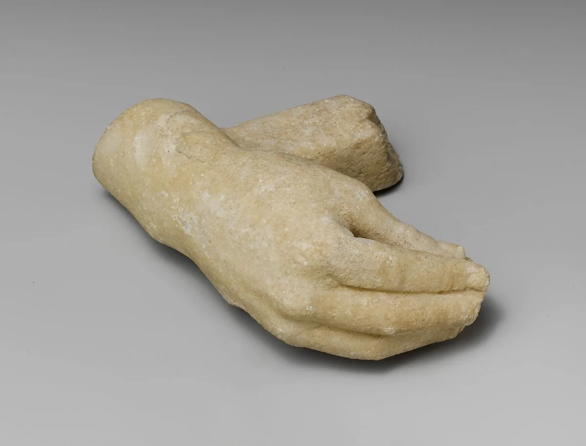 Marble right hand and wrist with a supporting strut — Unknown