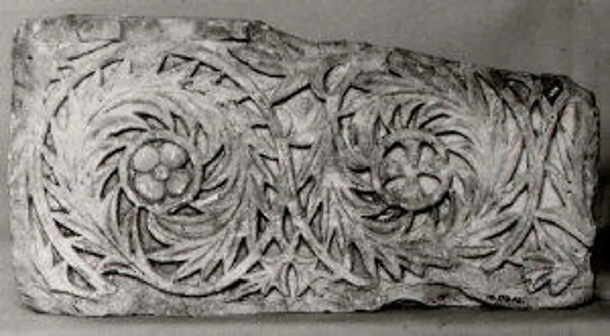 Fragment of a Frieze with Scrolls Enclosing a Rosette and a Cross — Unknown