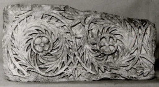 Fragment of a Frieze with Scrolls Enclosing a Rosette and a Cross