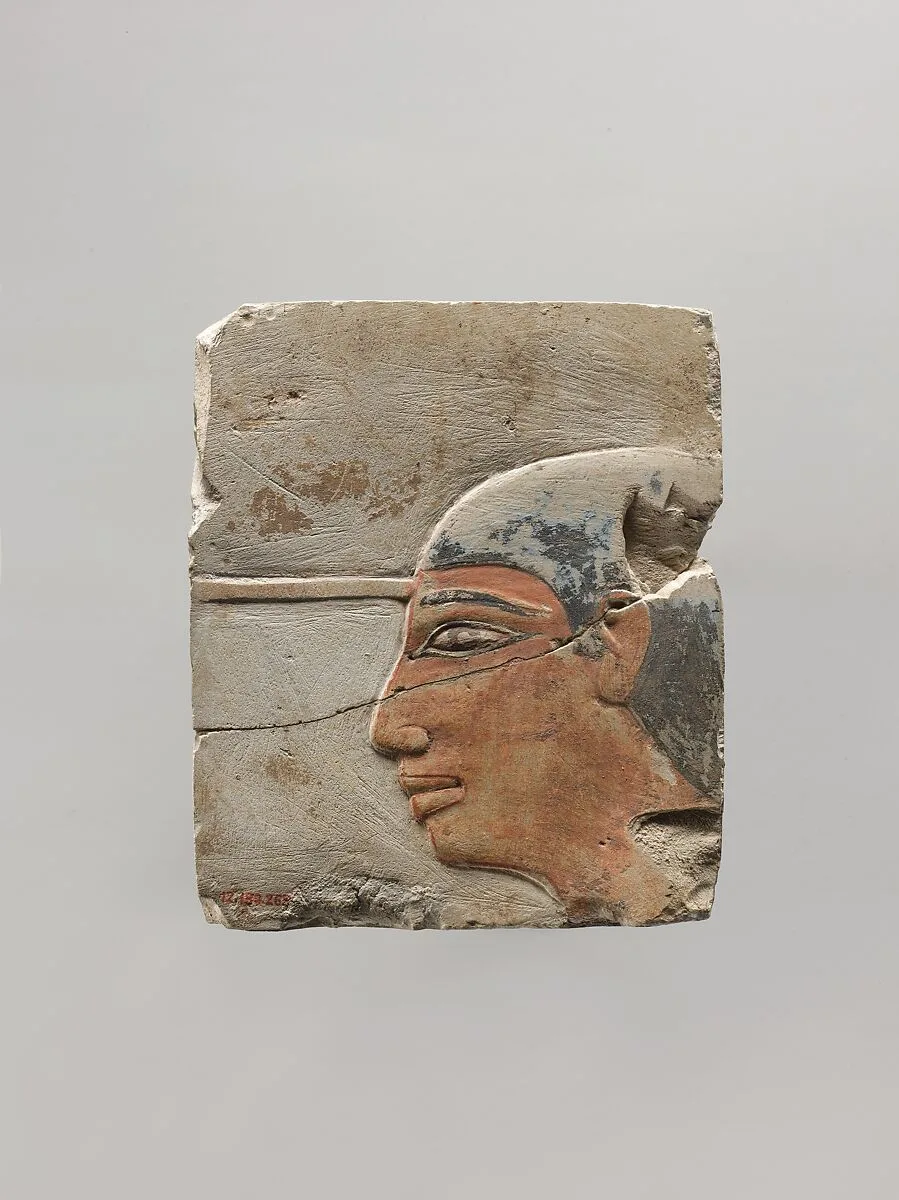 Relief depicting the head of a scribe — Unknown