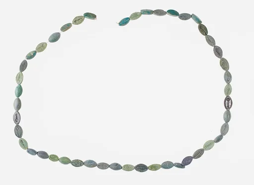 String of 46 Cowroids Inscribed with Various Hieroglyphs