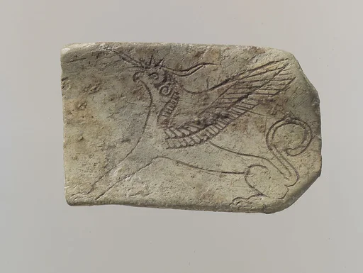 Furniture plaque: incised griffin