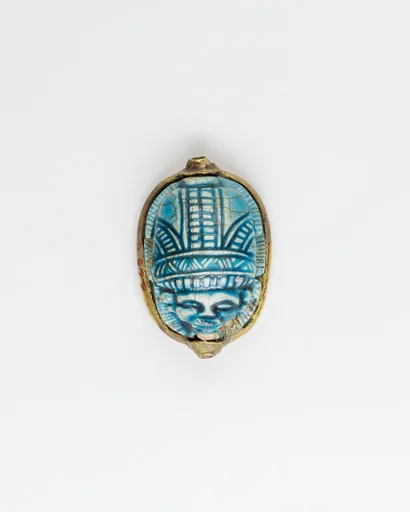 Human-headed scarab with device of sphinx and winged uraeus