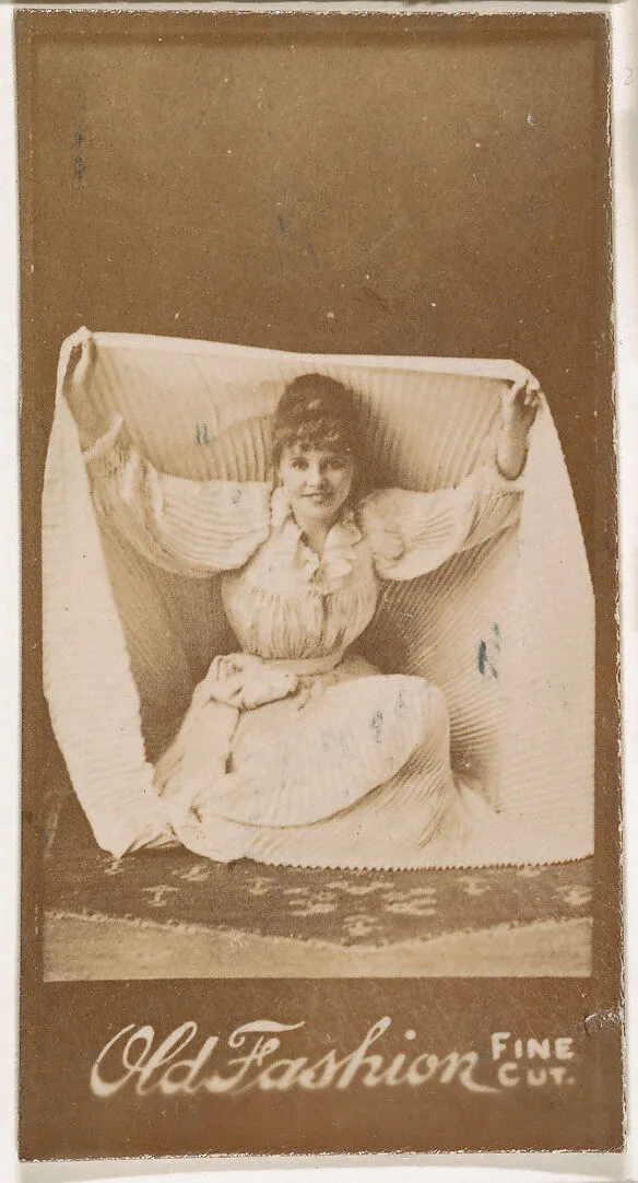 Actress holding part of skirt above head, from the Actresses series (N664) promoting Old Fashion Fine Cut Tobacco — Unknown