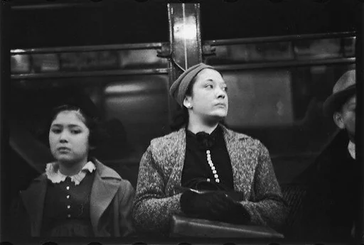 [Five 35mm Film Frames: Subway Passengers, New York City: Mother and Daughter]