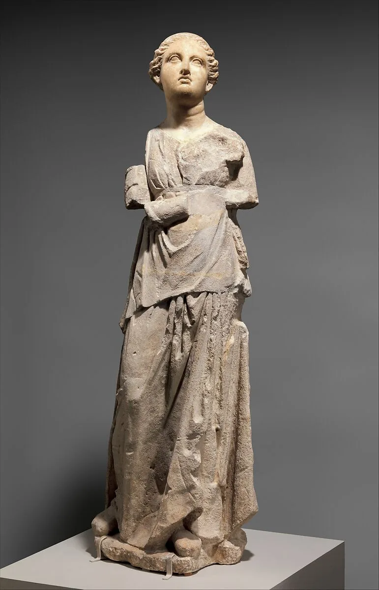 Marble and limestone statue of an attendant — Unknown