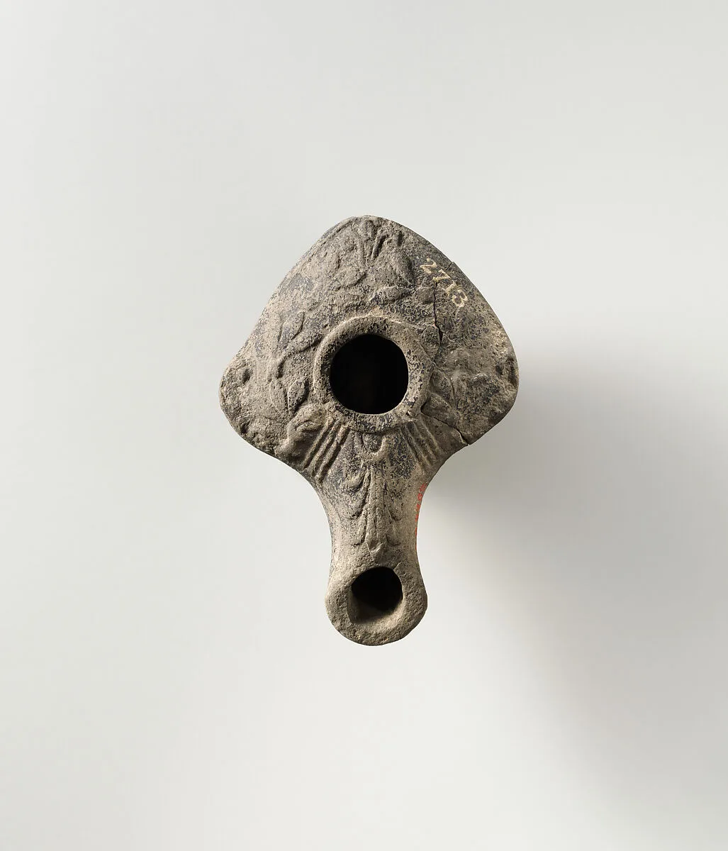 Terracotta oil lamp — Unknown