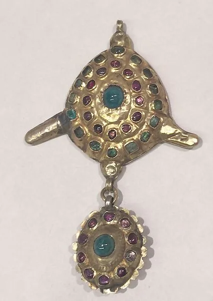 Pendant or Head Ornament — Unknown