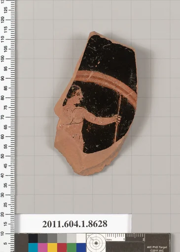 Terracotta fragment of a stemless kylix (drinking cup)
