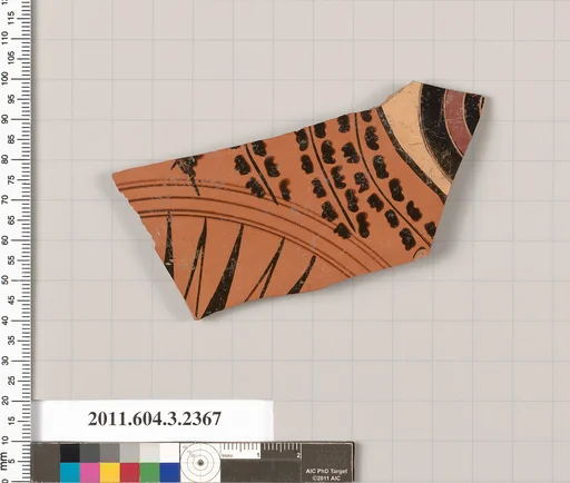 Terracotta fragment of a kylix: eye-cup (drinking cup)