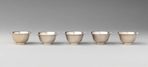 Five miniature cups