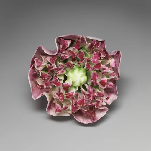 Porcelain flower (one of a set of nine)