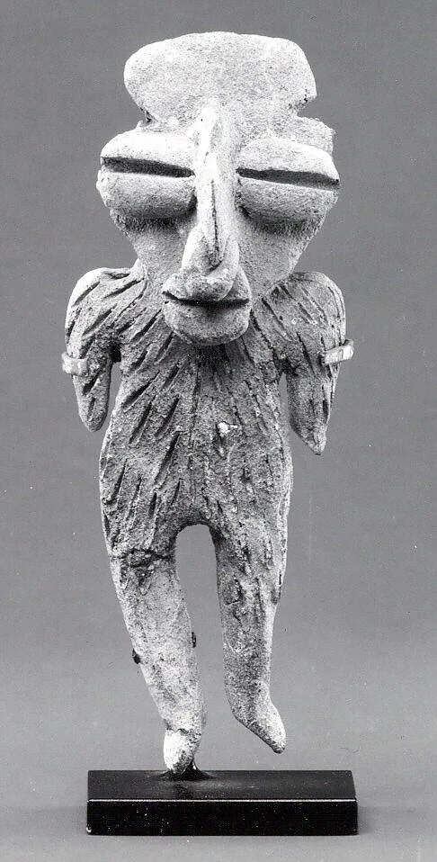 Standing Figure — Unknown
