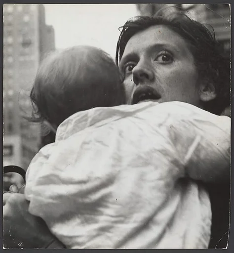 [Mother Holding Child, Herald Square, New York City]