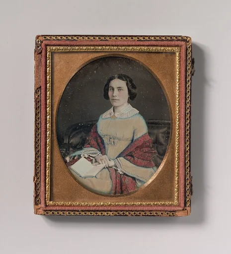 [Seated Young Woman Wearing a Shawl, Holding an Open Book in her Lap]