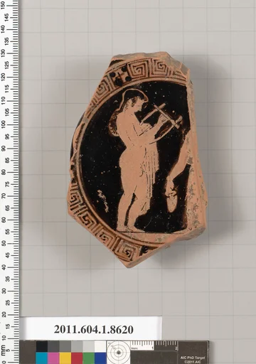 Terracotta fragment of a stemless kylix (drinking cup)