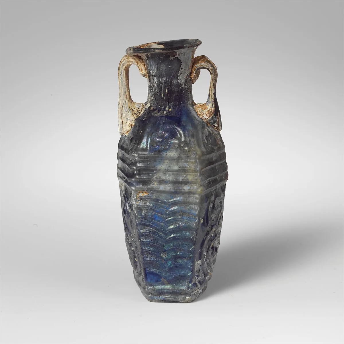 Glass hexagonal bottle — Unknown