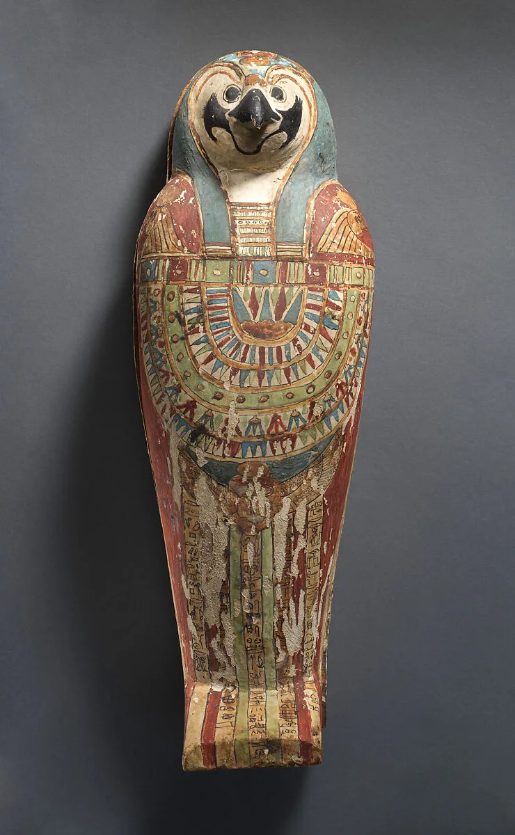 Falcon-form case containing a corn mummy — Unknown