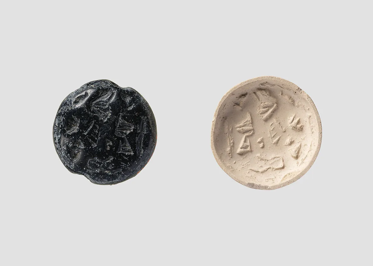Double convex discoid (bulla) seal engraved on two faces — Unknown
