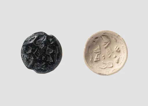 Double convex discoid (bulla) seal engraved on two faces