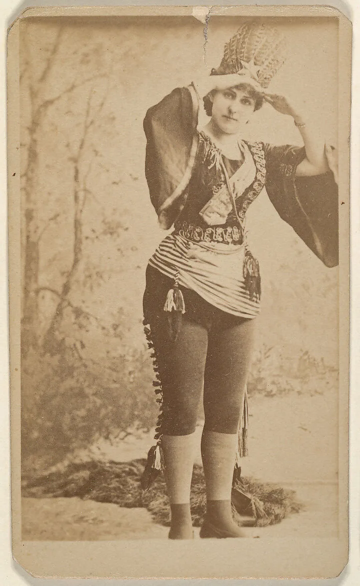 Actress adjusting hat, from the Actresses series (N668) — Unknown