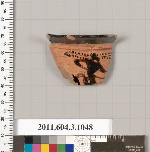 Terracotta fragment of a mastoid (drinking cup with narrow base)