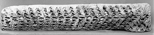 Fragment from a Molding with Vines and an Amphora (Vase)