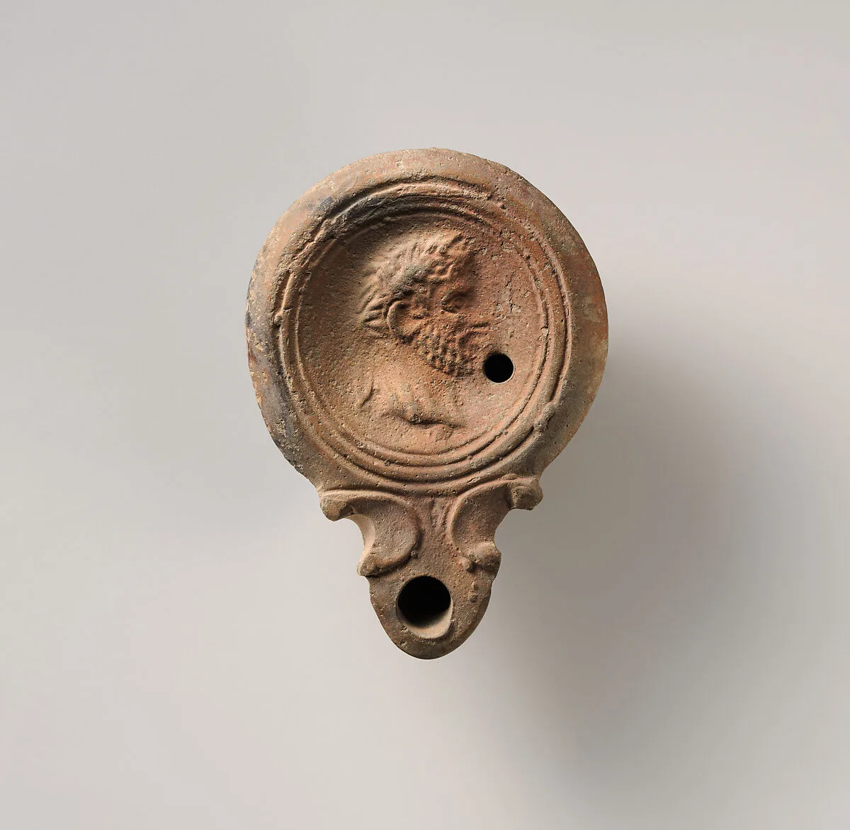 Terracotta oil lamp — Unknown