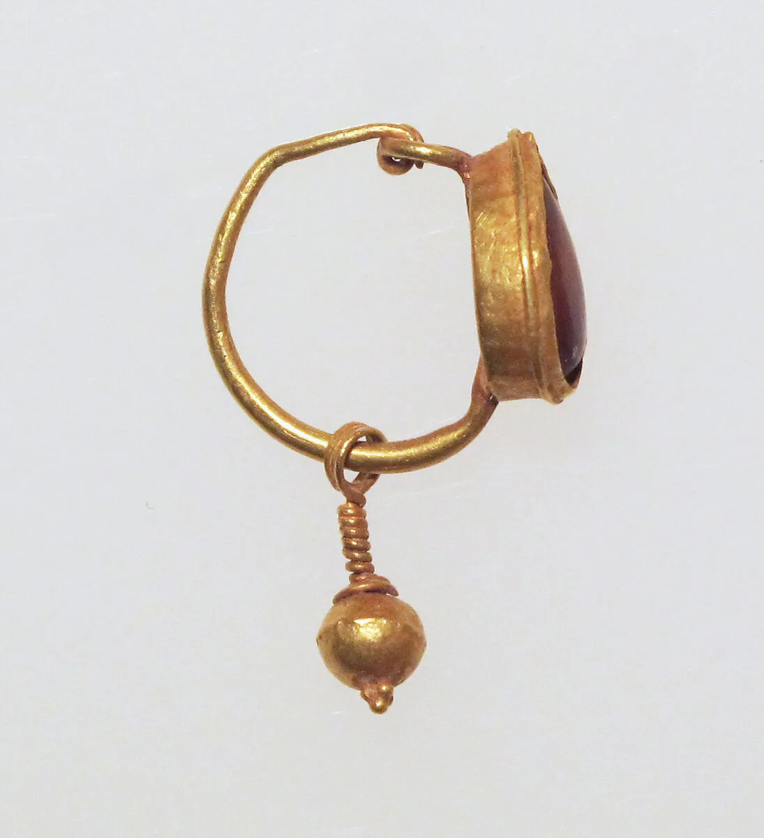 Earring with ball pendant and sard setting — Unknown