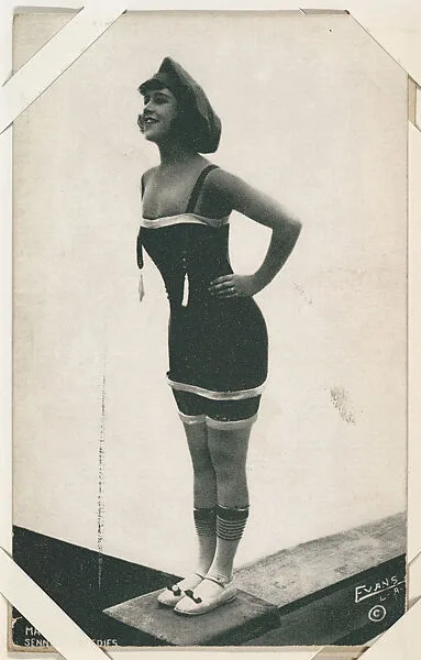 Bathing beauty with hand on hip from Mack Sennett Comedies Arcade series (W423) — Unknown