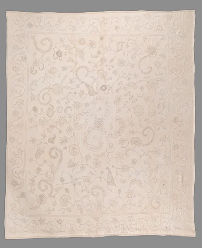 Embroidered coverlet