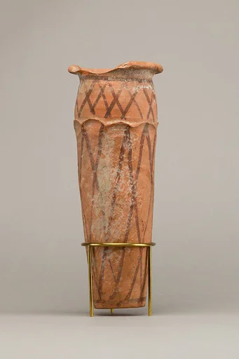 Wavy-handled jar with cross hatching design