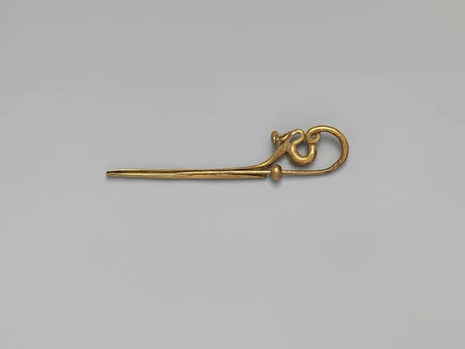 Gold serpentine fibula (safety pin)