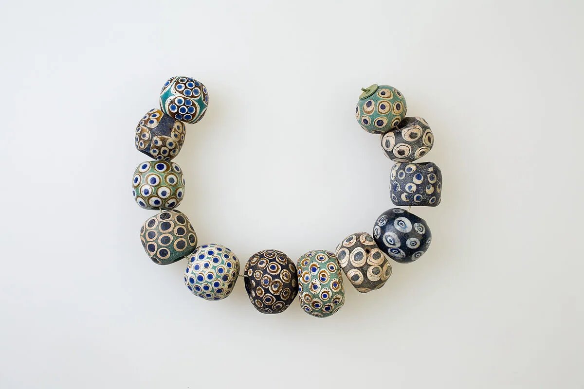 String of 12 Eye Beads — Unknown