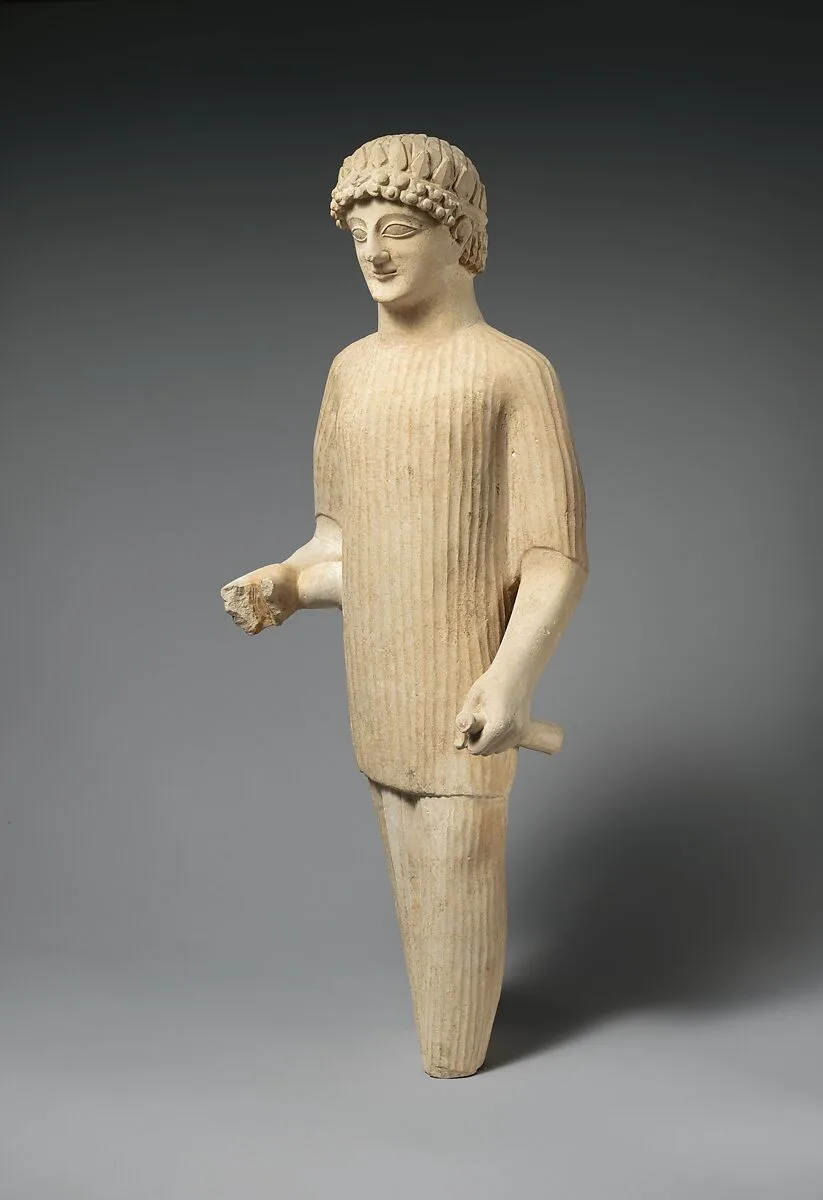 Limestone statue of a male votary wearing a wreath and long tunic — Unknown