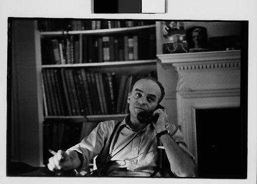 [Six 35mm Film Frames: Charles Fuller on Telephone]