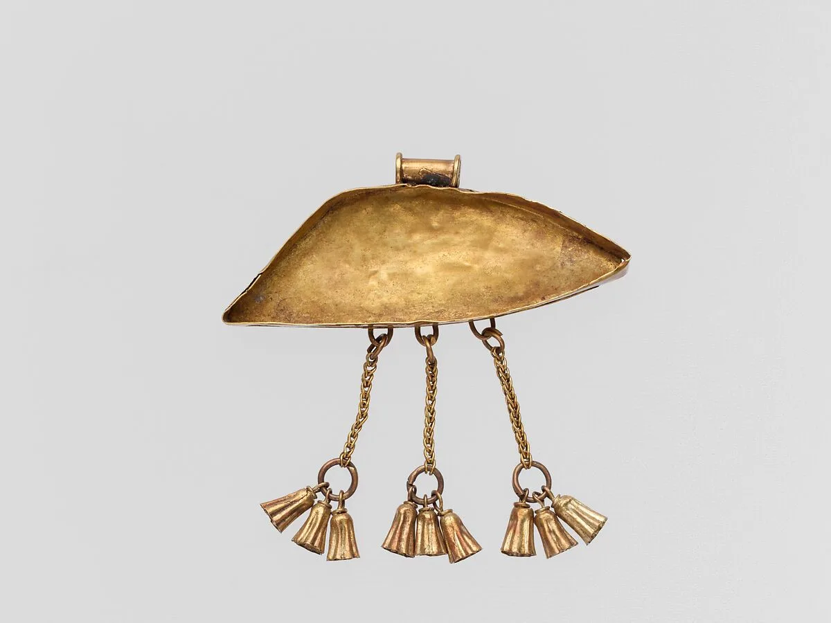 Gold eye-shaped pendant with three tassels — Unknown