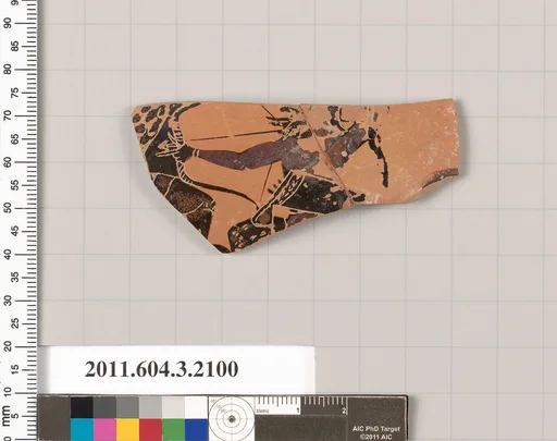 Terracotta fragment of a kylix (drinking cup)