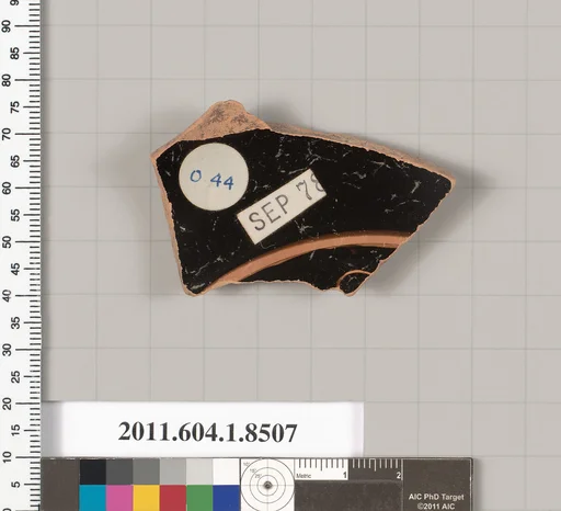 Terracotta fragment of a stemless kylix (drinking cup)