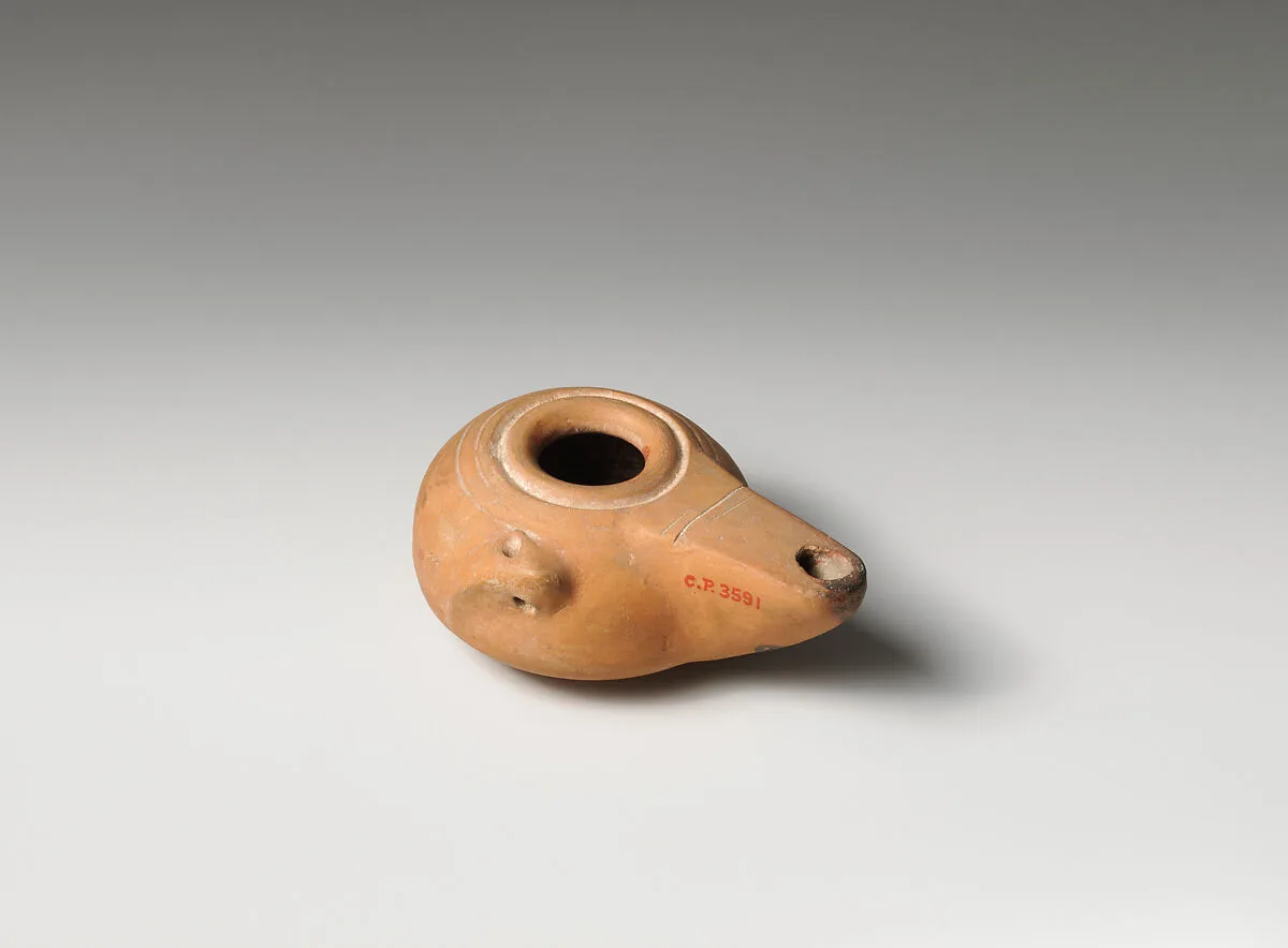 Terracotta oil lamp — Unknown