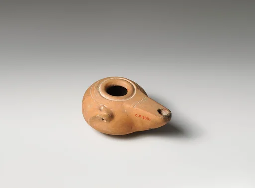 Terracotta oil lamp