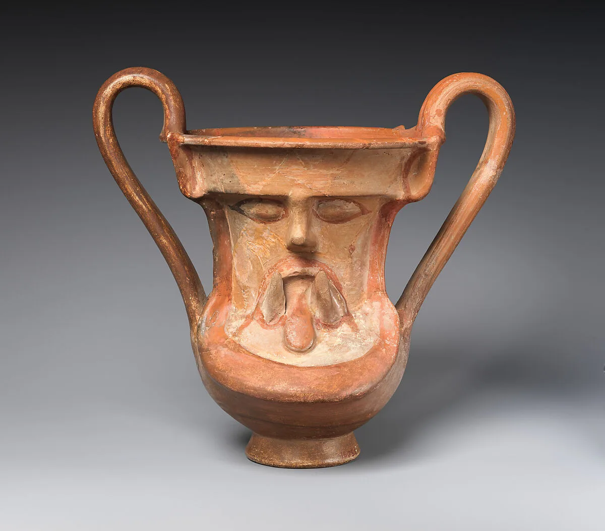 Terracotta kantharos (wine cup) with a satyr's mask on both sides — Unknown